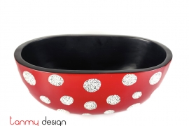 Red oval bowl attached with eggshell rounds